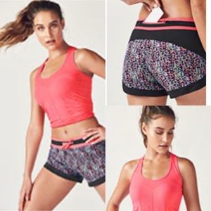 Fabletics Omara Outfit in Fuchsia- Runner Shorts and Racerback Tank